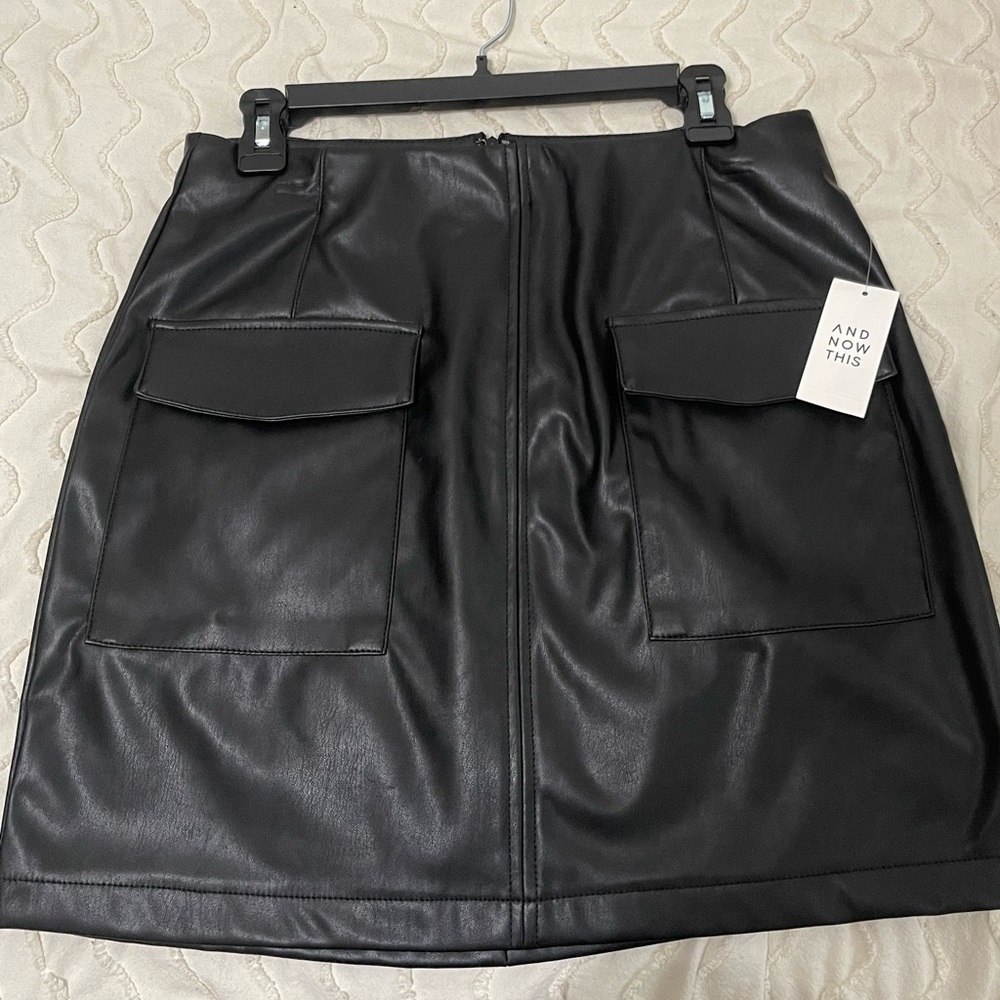 Faux leather, bought at Macys! Brand new ! Open to any offer